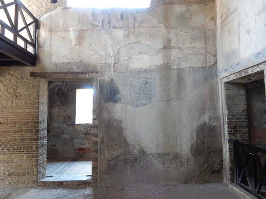 IV.21, Herculaneum. May 2018. Room 24, looking towards south wall and doorway to cryptoporticus 28, left.
Photo courtesy of Buzz Ferebee.